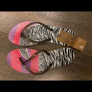 New with tags reef flip flops